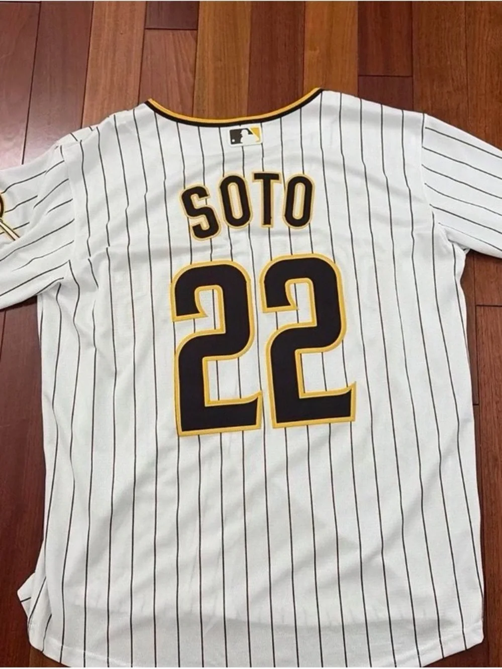 Nike Padres White Pinstripe Jersey with Black and Gold Accents